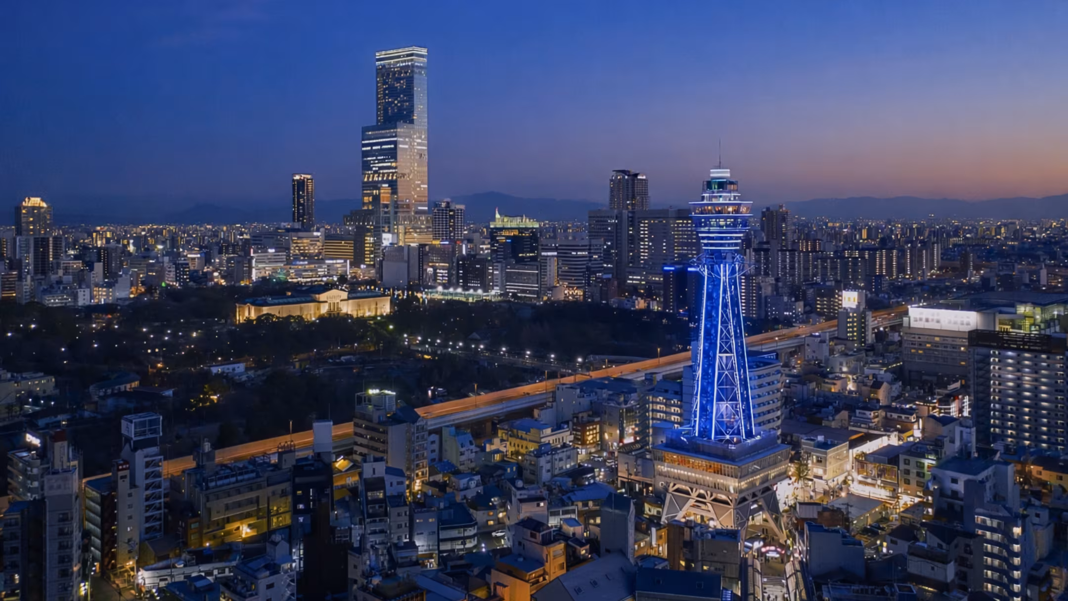 Osaka cityscape at night with Tsutenkaku Tower